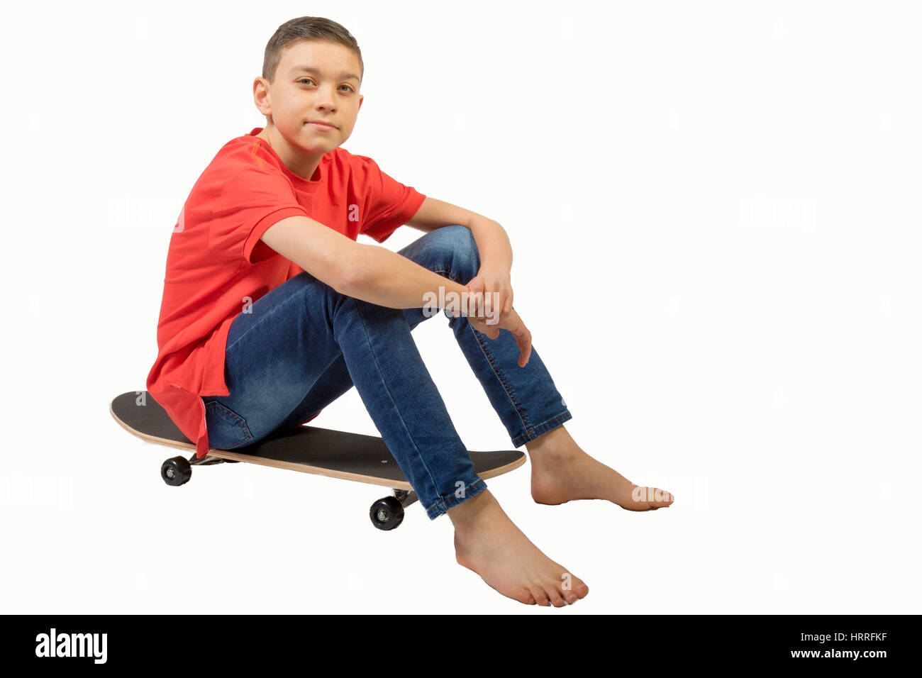 Young teenage caucasian boy with his skateboard Stock Photo - Alamy