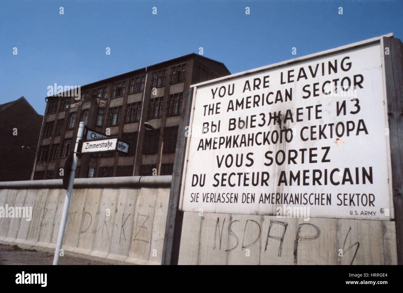 The Berlin Wall near the border crossing Checkpoint Charlie (1979 Stock