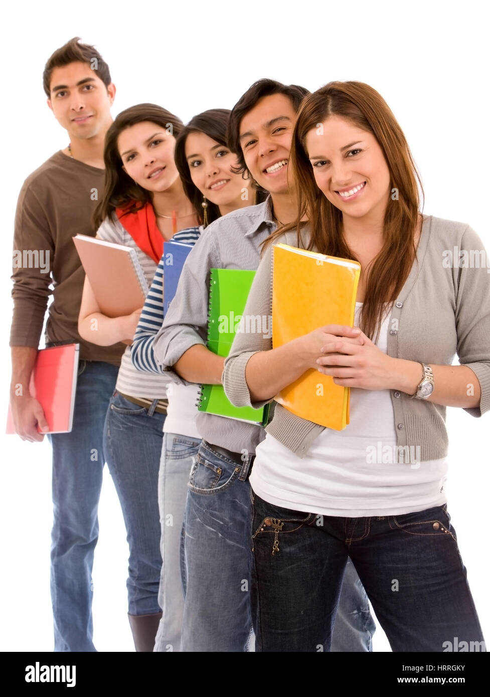 Group of students lined up holding notebooks isolated on a white ...
