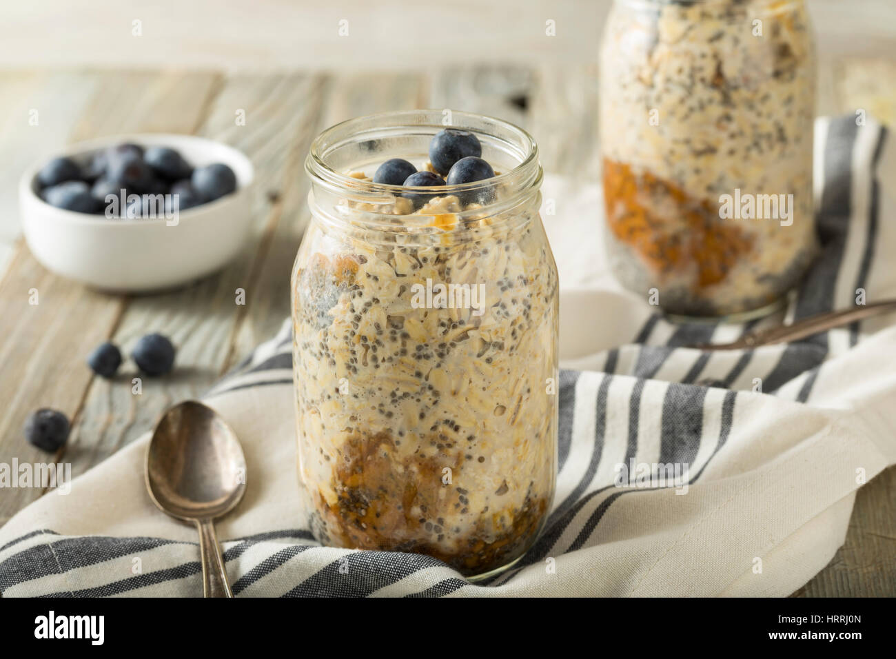Healthy Homemade Overnight Oats Oatmeal With Chia And Peanut Butter Stock Photo Alamy