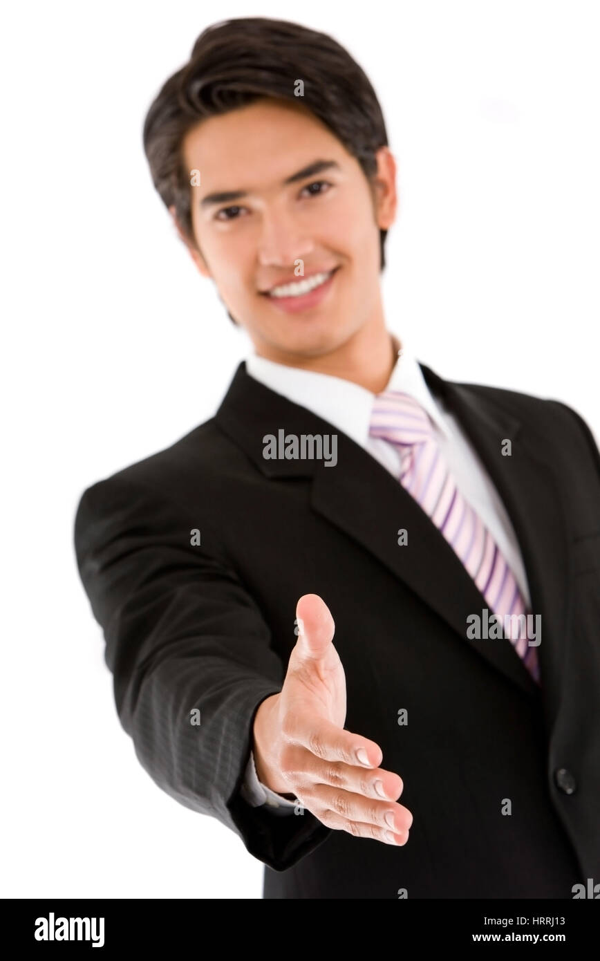 Business man extending his hand offering to close a deal over a white ...