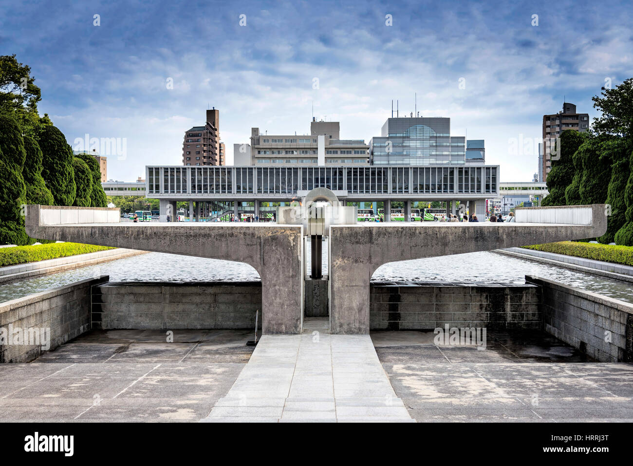Hiroshima, Japan - April 27, 2014: View of the Hiroshima Peace Memorial Museum behind the Peace Flame Stock Photo