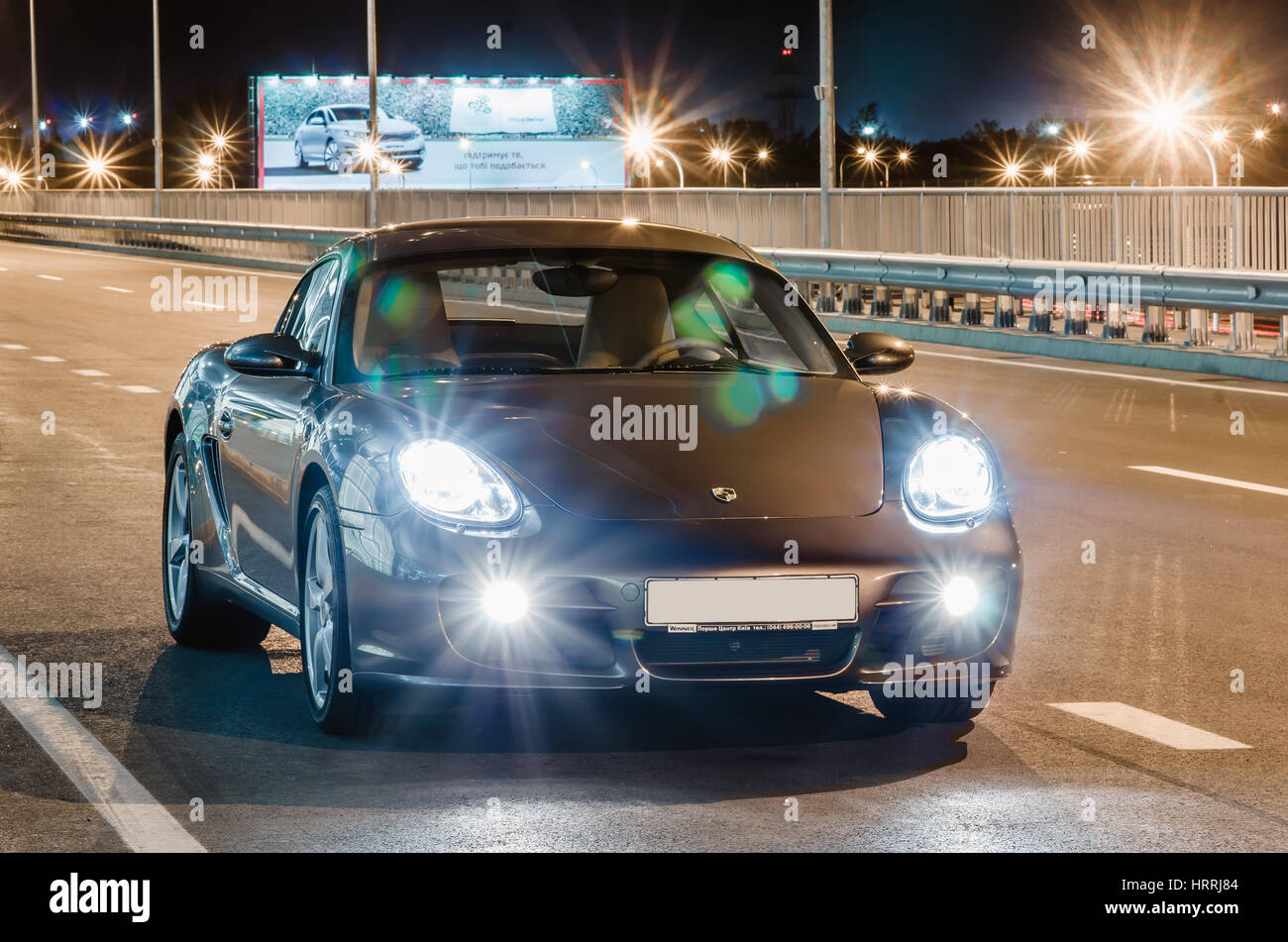 Kyiv, Ukraine - April 4th, 2014: Night photoshoot of Porsche Cayman near Boryspil Airport Stock Photo