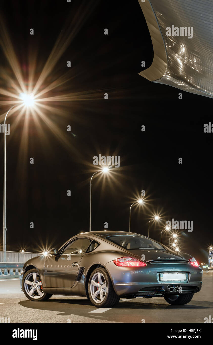 Kyiv, Ukraine - April 4th, 2014: Night photoshoot of Porsche Cayman near Boryspil Airport Stock Photo
