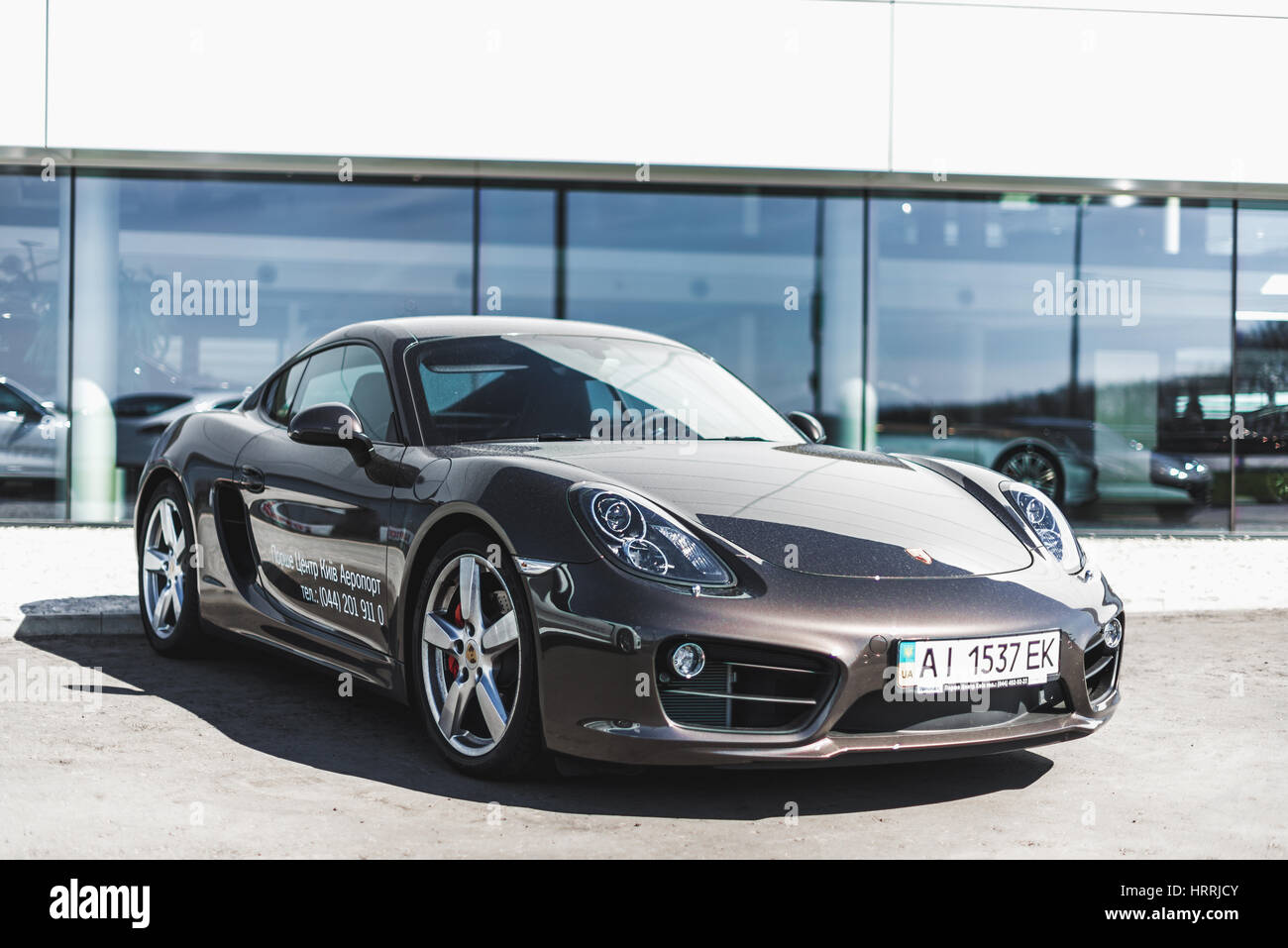 Kyiv, Ukraine - April 4th, 2014: Photoshoot of Porsche Cayman near automotive center 'Porsche Center Kyiv Airport' Stock Photo