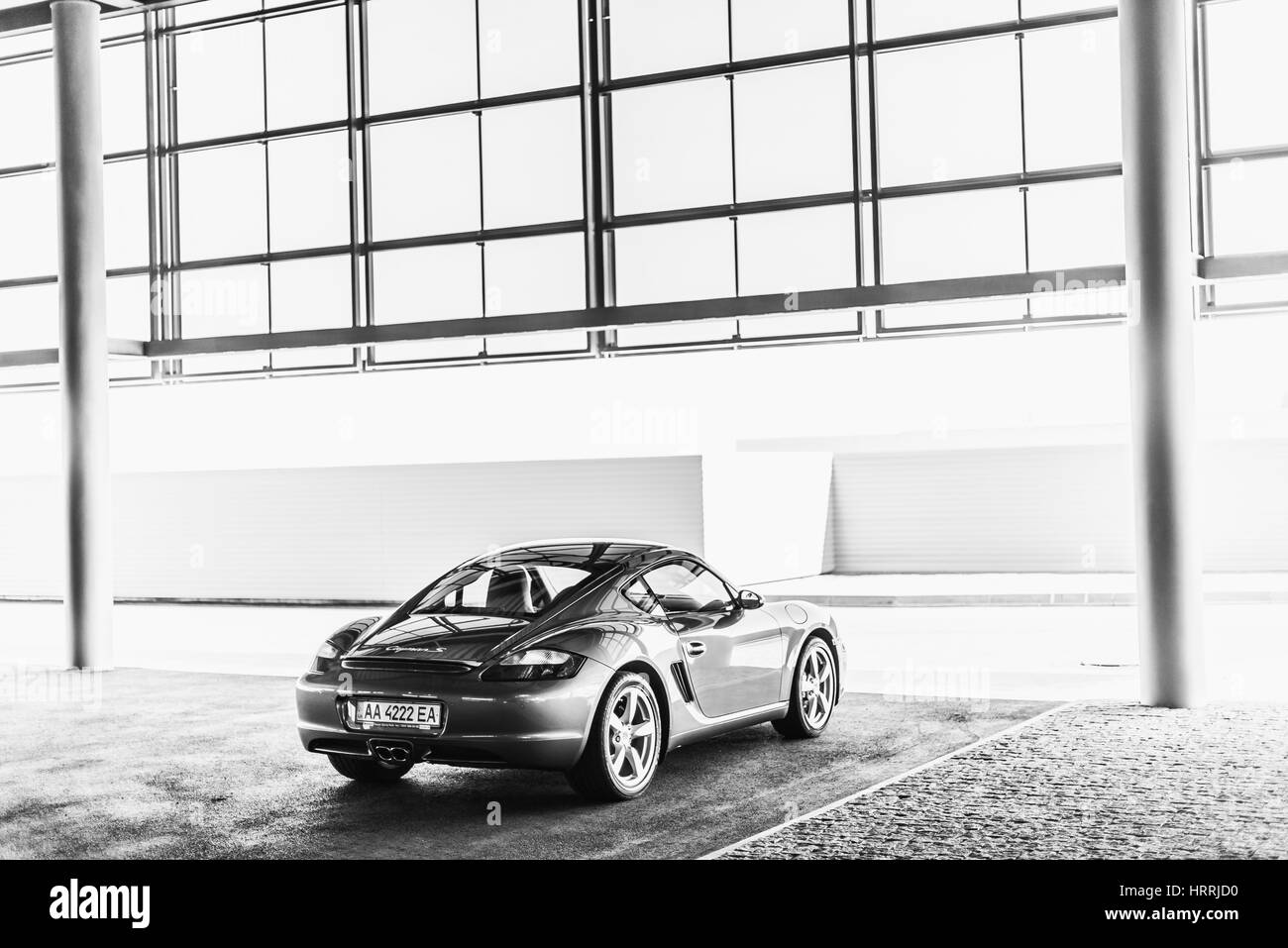 Kyiv, Ukraine - April 4th, 2014: Photoshoot of Porsche Cayman near automotive center 'Porsche Center Kyiv Airport' Stock Photo