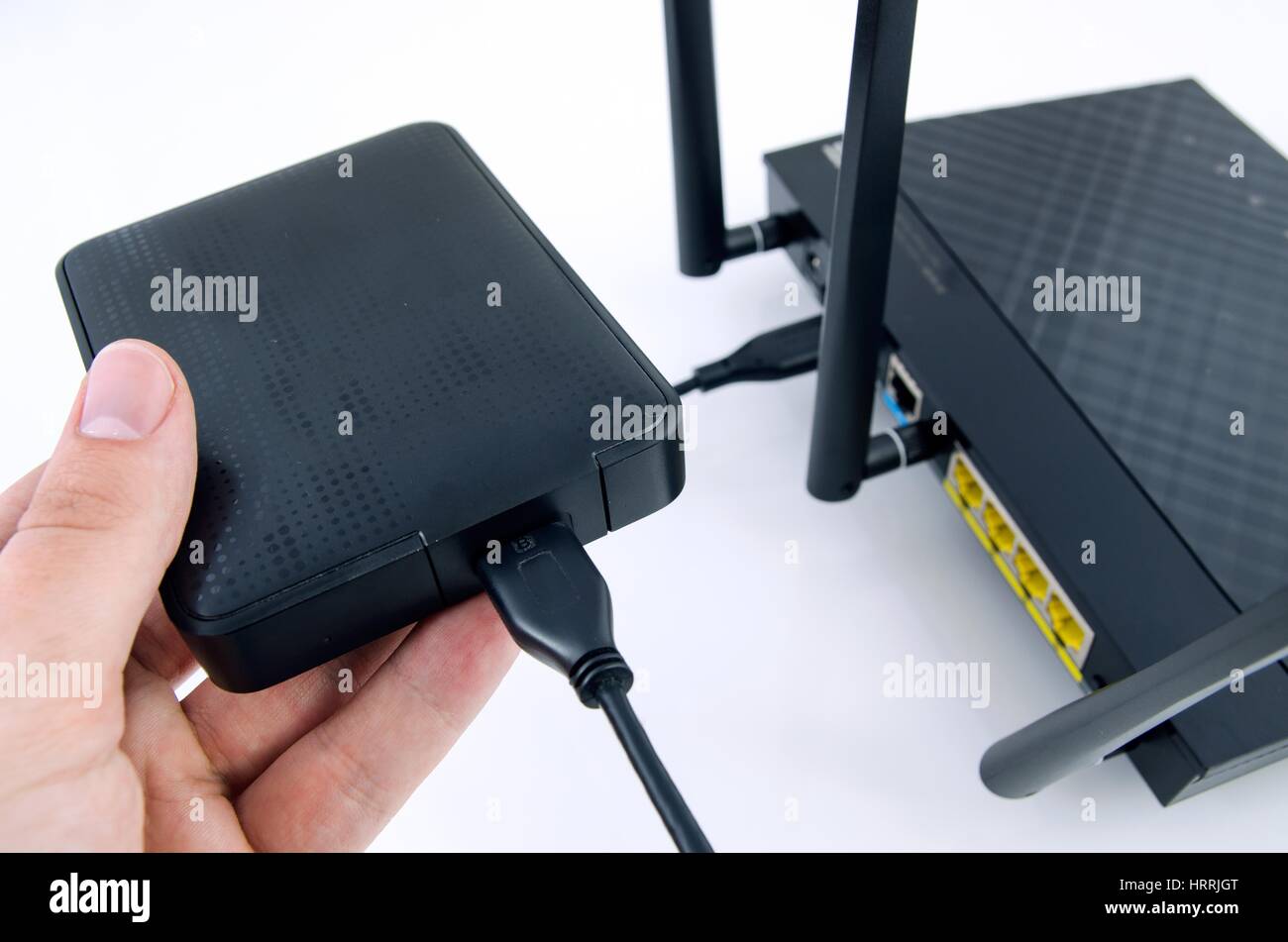 Router with backup storage disk. DLNA media server from USB disk Stock Photo
