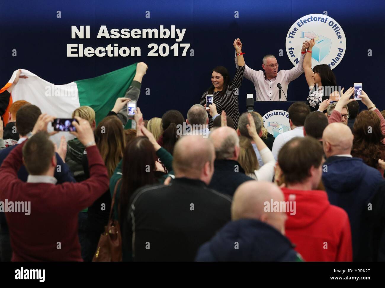 Sinn Fein candidates for Fermanage South Tyrone Jemma Dolan (left), Sean Lynch and Michelle Gildernew at the Omagh count centre having been deemed elected in Northern Ireland's Assembly election. Stock Photo