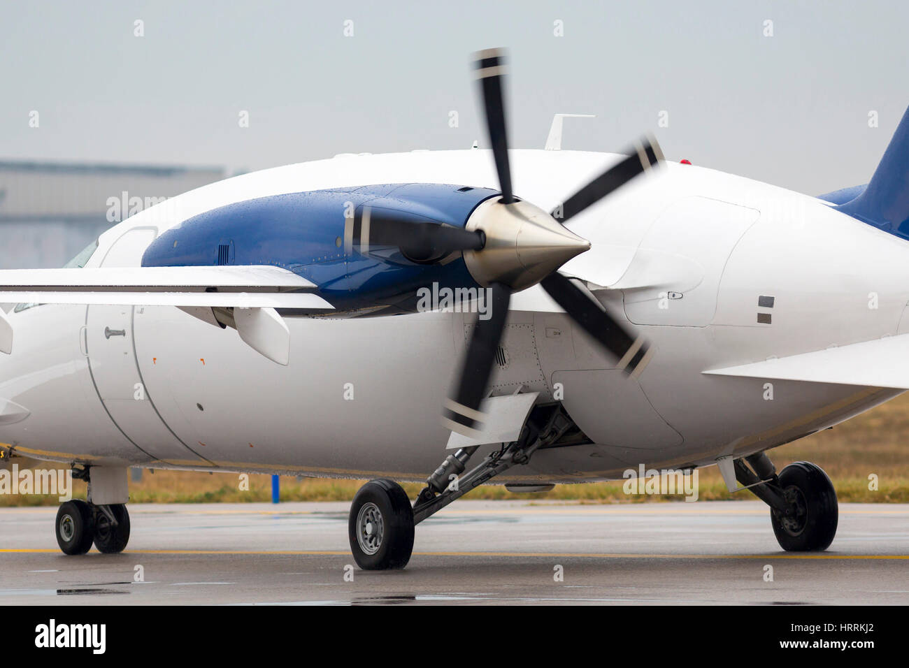 A small private propeller plane seconds before flying out to the runway at Sofia airport. Stock Photo