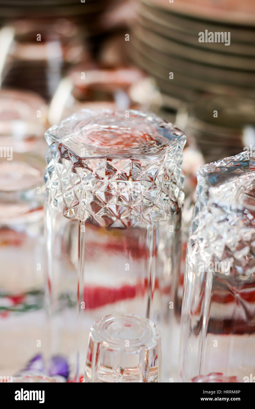 Washed glasses turned upside down and other various dishes on home