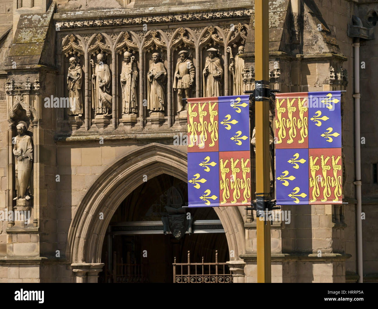 Vaughan porch entrance of Leicester Cathedral with King Richard III coat of arms flags in front, Leicester, England, UK Stock Photo