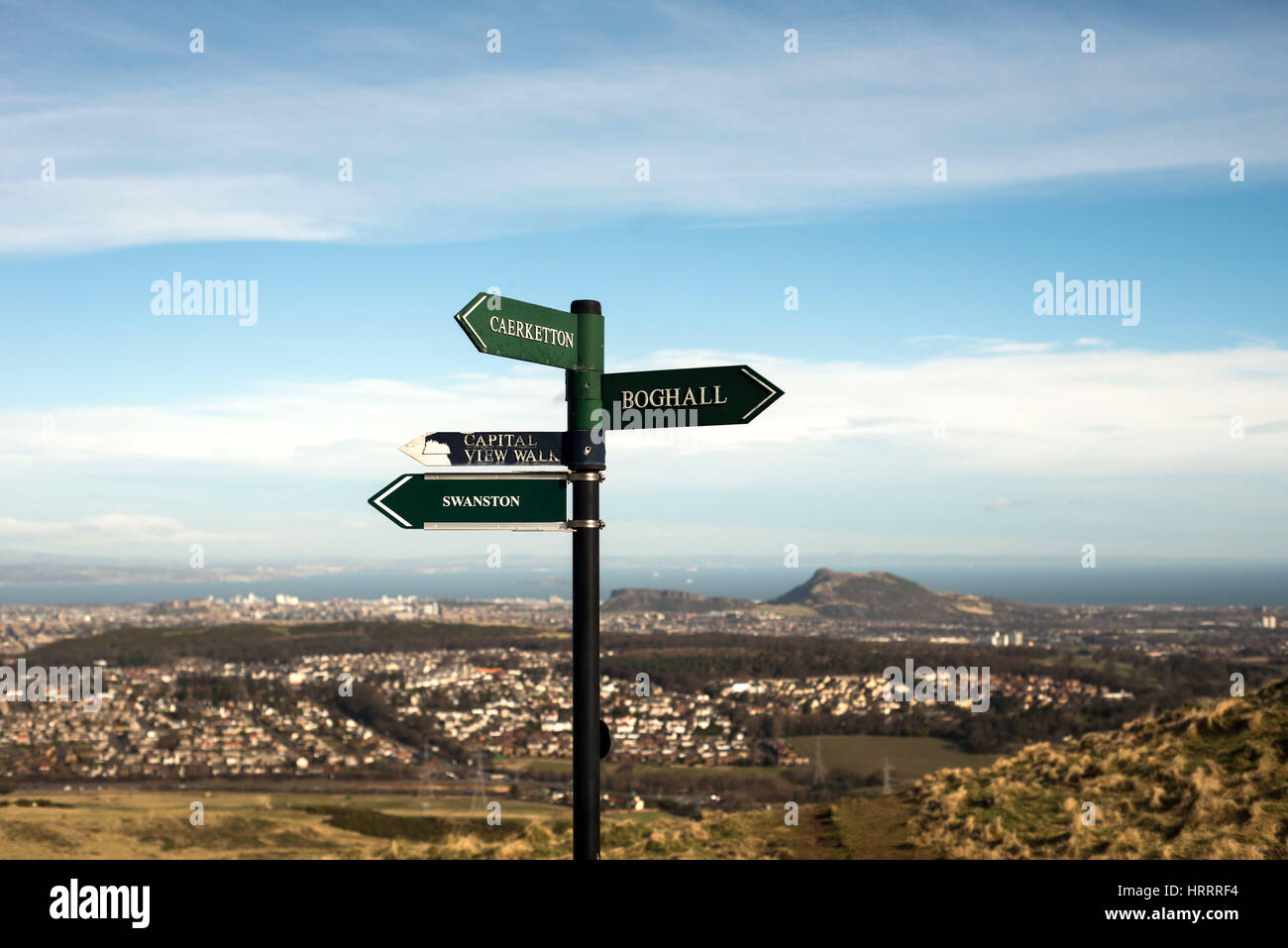 sign post at hillend edinburgh with arthurs seat in background. places are boghall swanston capital view walk Stock Photo