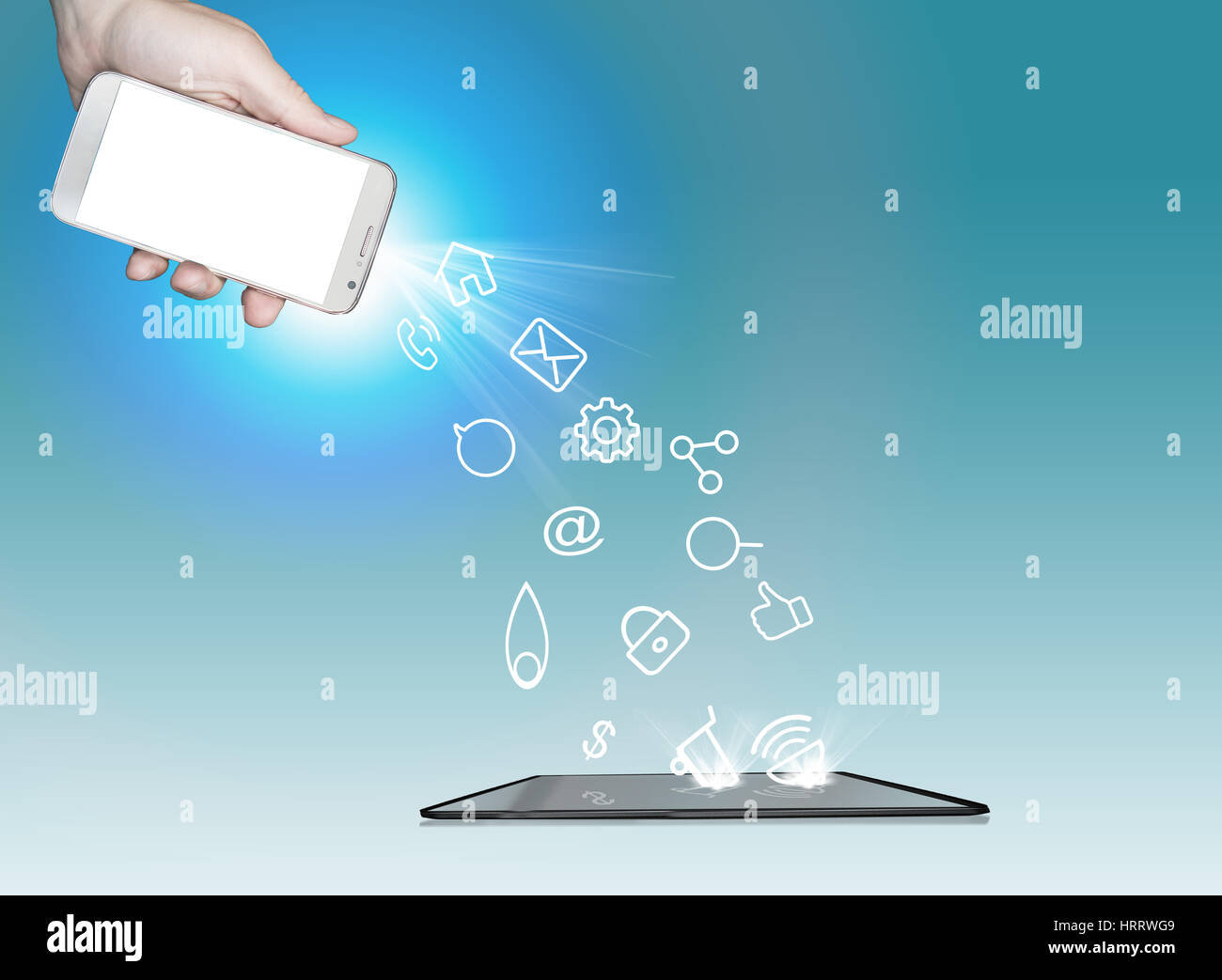 Transfer data from smartphone to the tablet Stock Photo Alamy