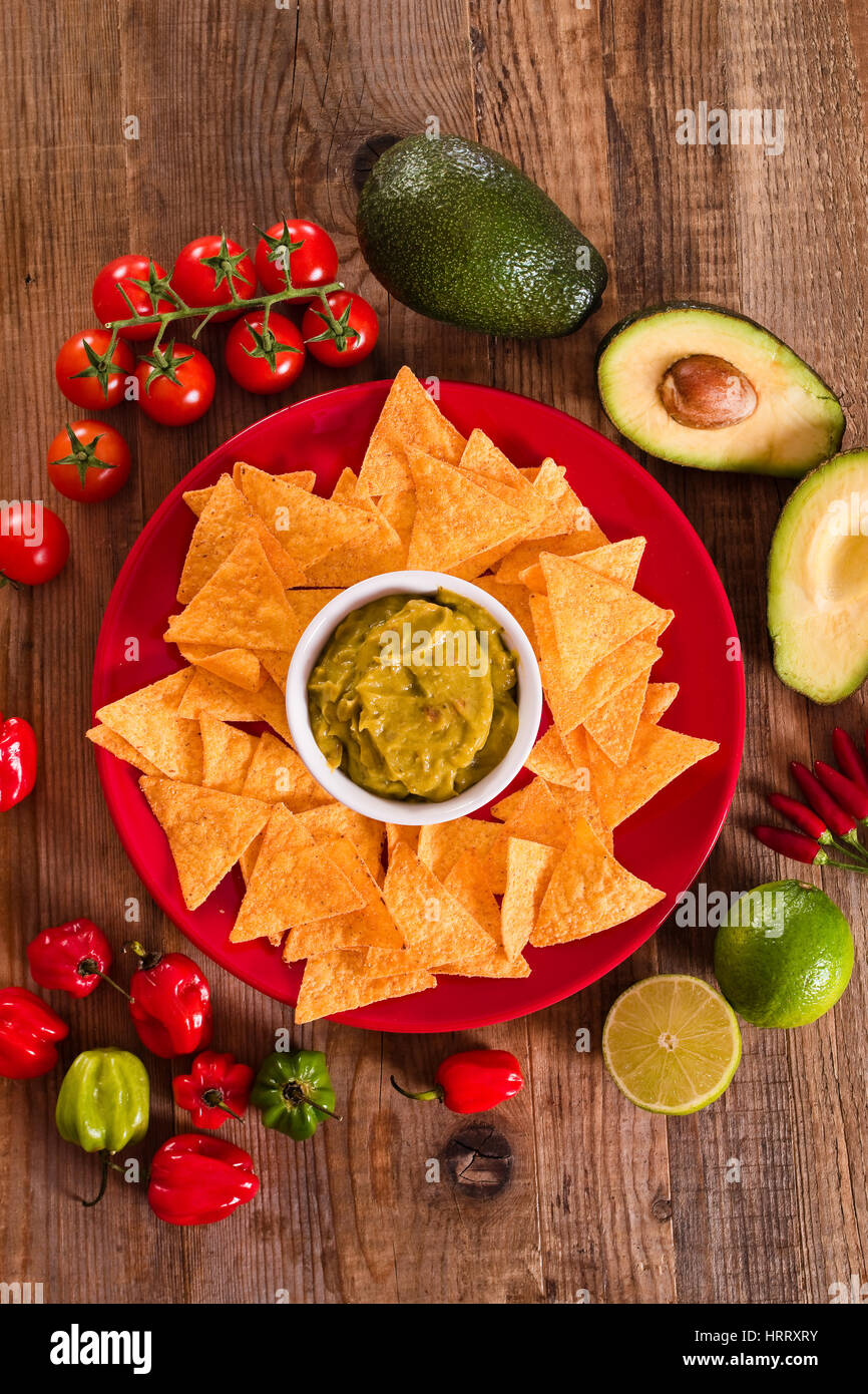Guacamole and nacho chips Stock Photo Alamy