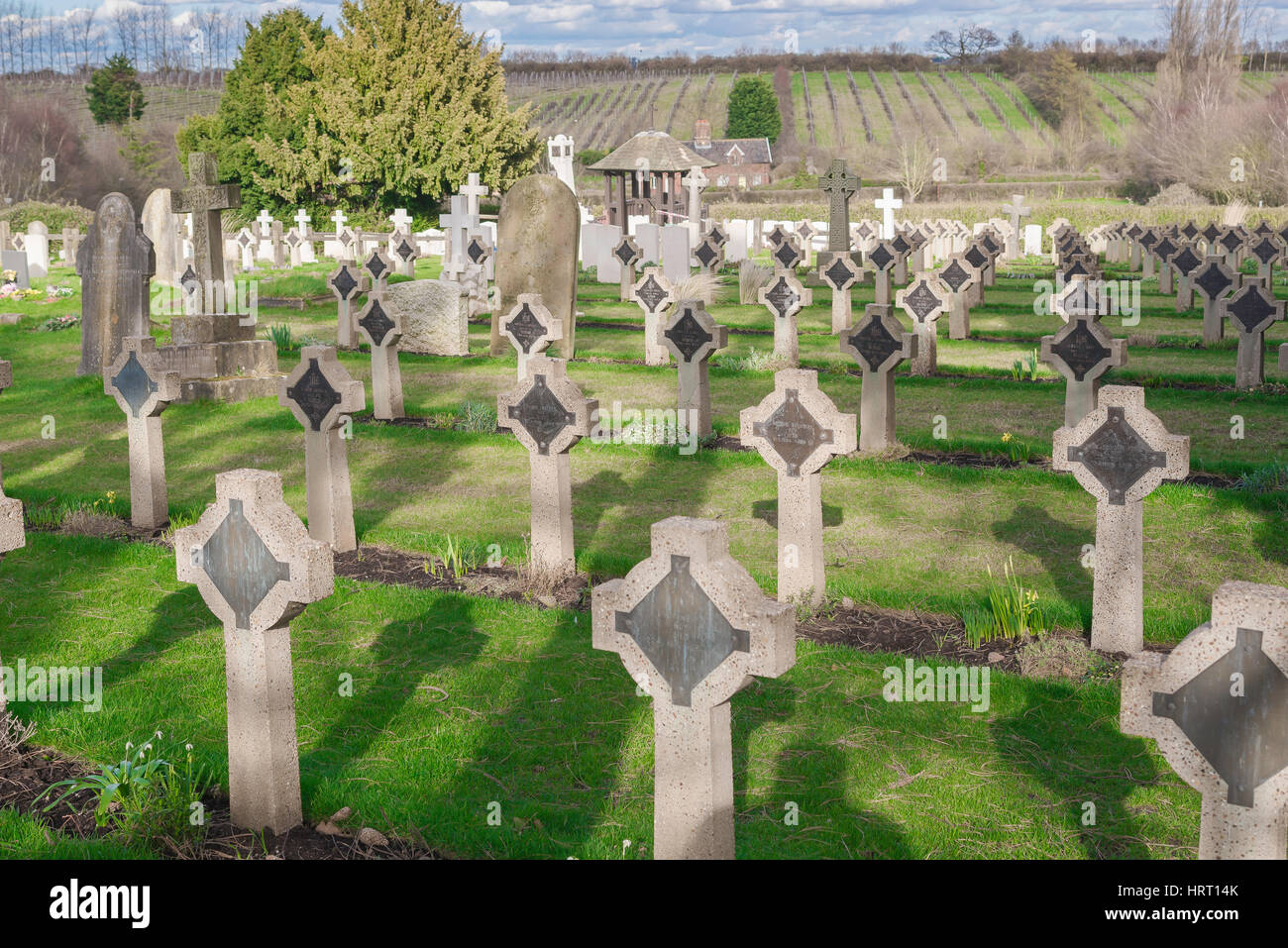 The churchyard at St Mary Shotley contains a naval Commonwealth War Graves site, the last resting place of many young sailors,Shotley Suffolk, UK Stock Photo