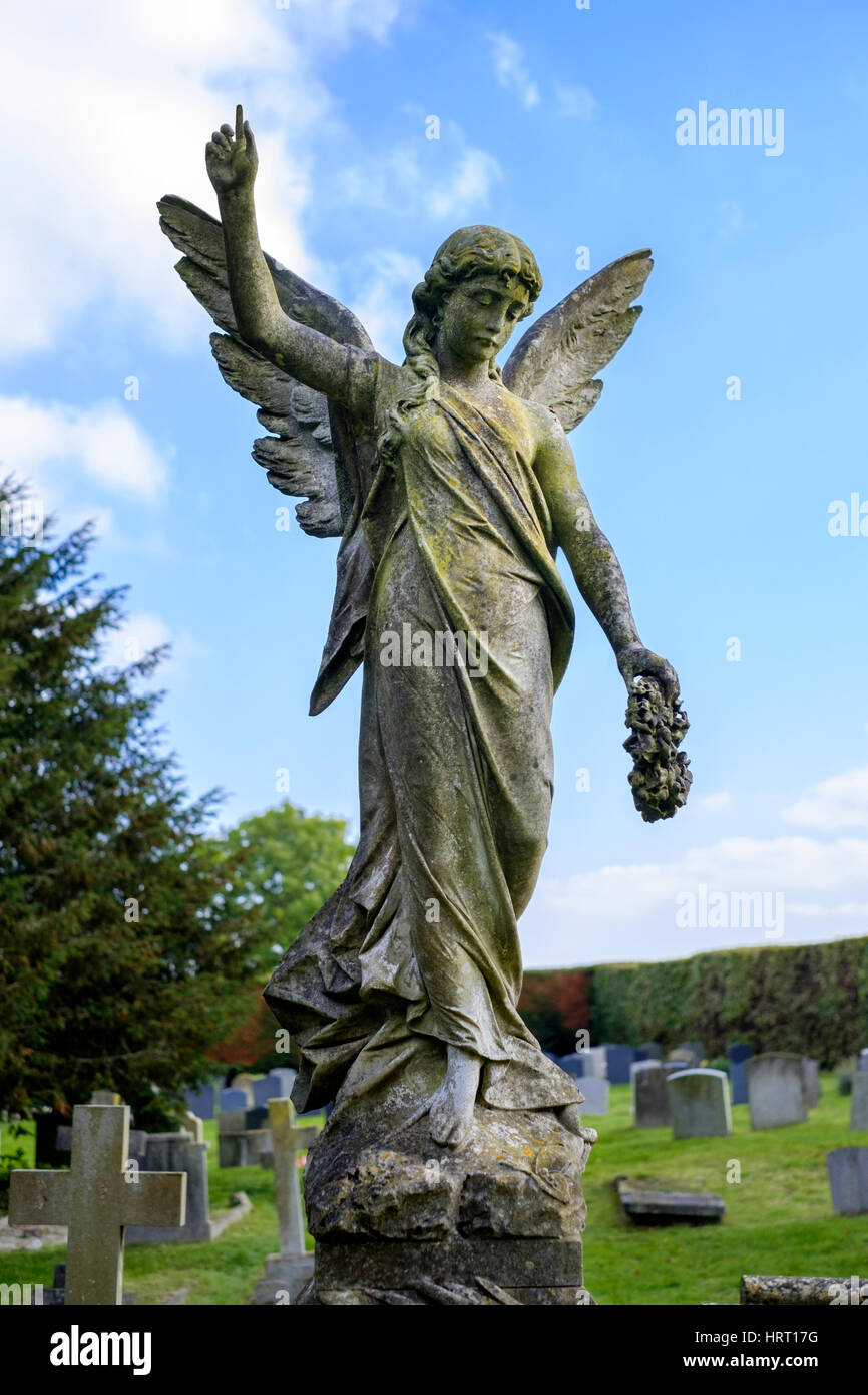 Memorial statue of an angel in a graveyard Stock Photo Alamy