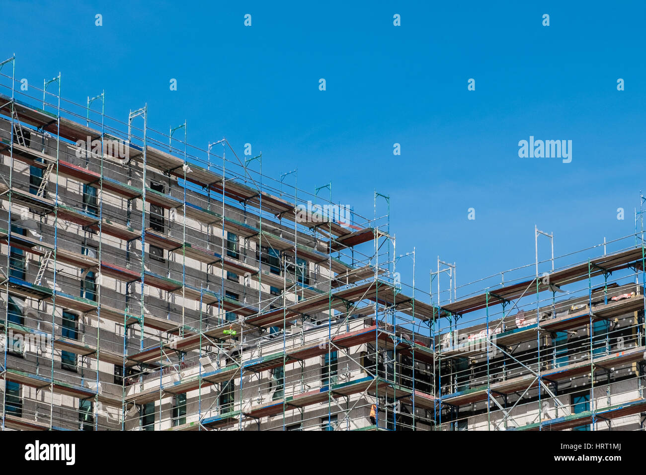 building construction site with scaffolding building industry Stock Photo Alamy