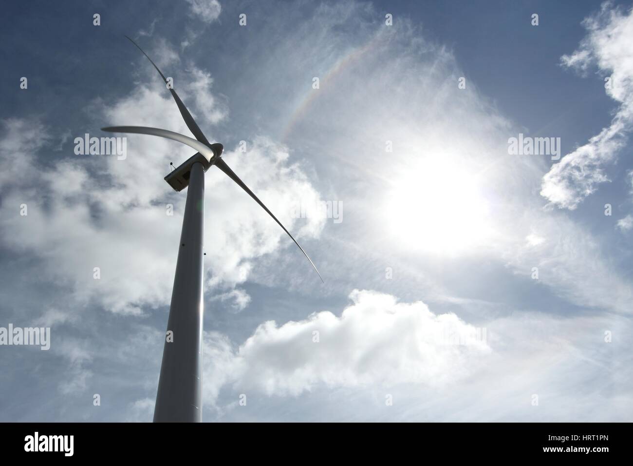 wind turbine against blue sky Stock Photo - Alamy