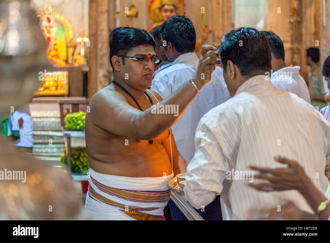 Priests, believers in Sri Veeramakaliamman Temple, Serangoon Road, Hindu temples, Little India District, Singapore, Asia, Singapore Stock Photo
