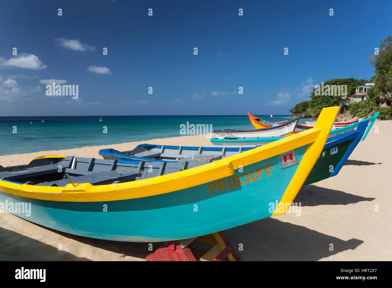 Row Of Brightly Painted Yola Fishing Boats Crash Boat Beach Aguadilla Puerto Rico Stock Photo Alamy