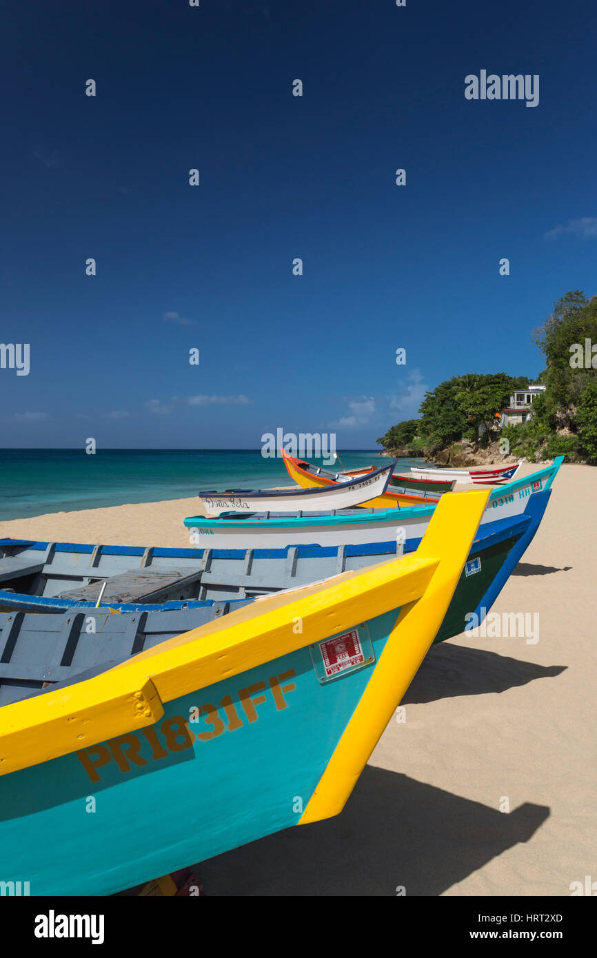 ROW OF BRIGHTLY PAINTED YOLA FISHING BOATS CRASH BOAT BEACH AGUADILLA