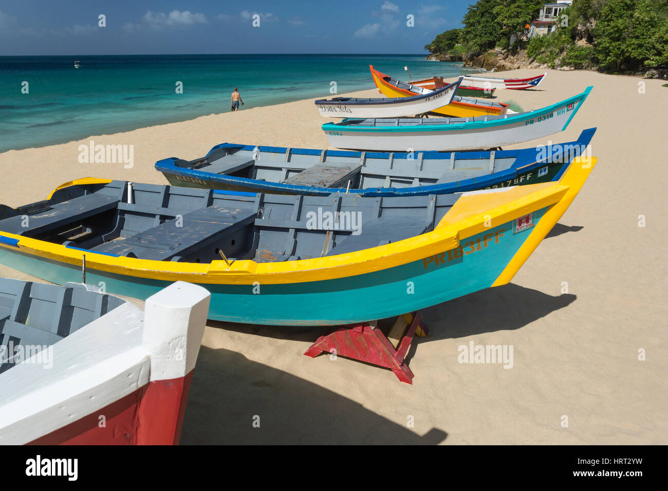 ROW OF BRIGHTLY PAINTED YOLA FISHING BOATS CRASH BOAT BEACH AGUADILLA