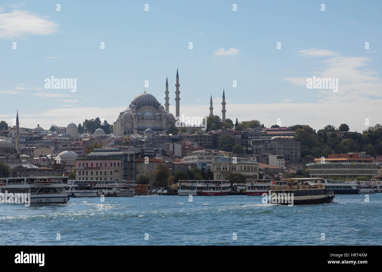 FERRY CROSSING THE BOSPHORUS ISTANBUL WITH VIEW OF SULEYMANIYE MOSQUE TURKEY Stock Photo