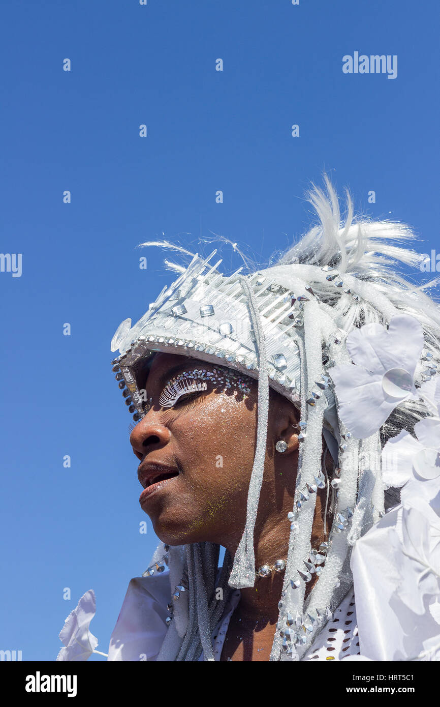FEBRUARY 9, 2016 - Rio de Janeiro, Brazil - Brazilian woman of African descent in bright white costume during Carnaval 2016 street parade Stock Photo