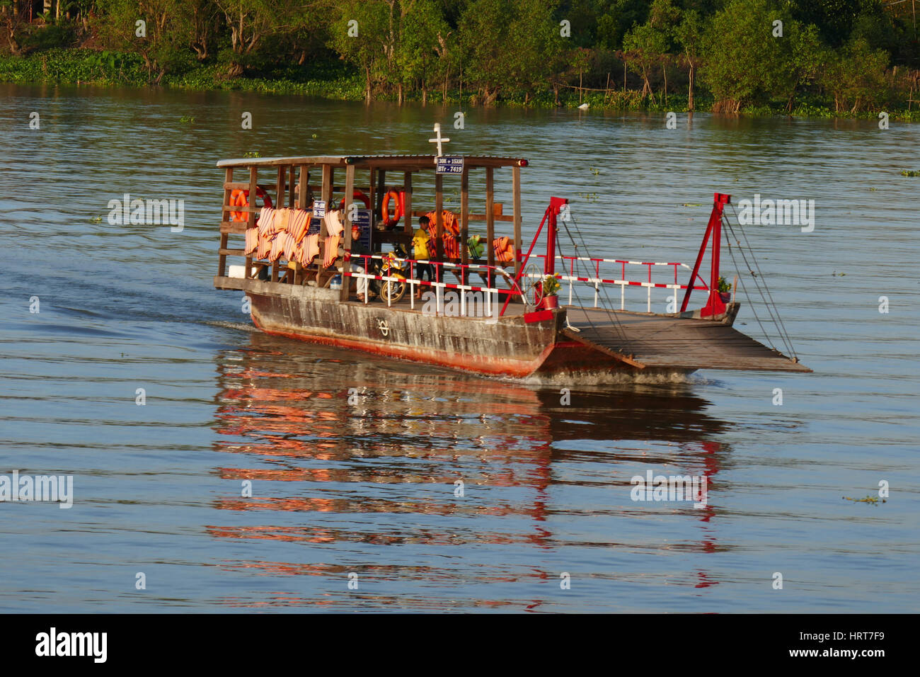 Ferry across the Mekong river, Vietnam Stock Photo - Alamy