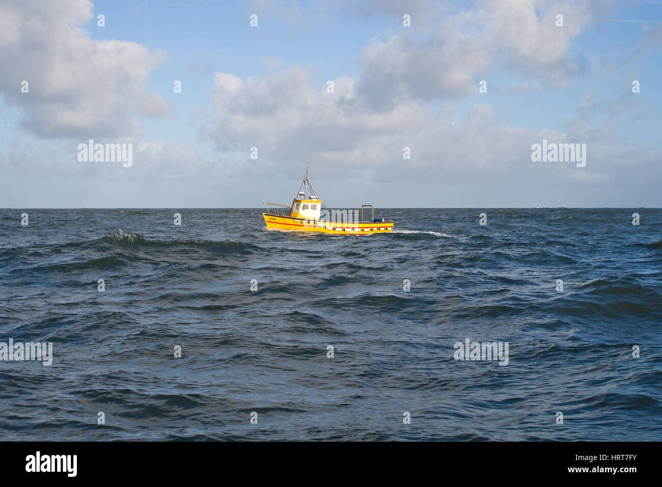Small Yellow Boat Stock Photo - Alamy