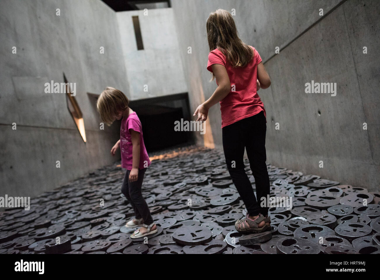 Berlin. Germany. Jewish Museum. Shalekhet (Fallen Leaves) art installation in the Memory Void, by Israeli artist Menashe Kadishman consists of over 10 Stock Photo