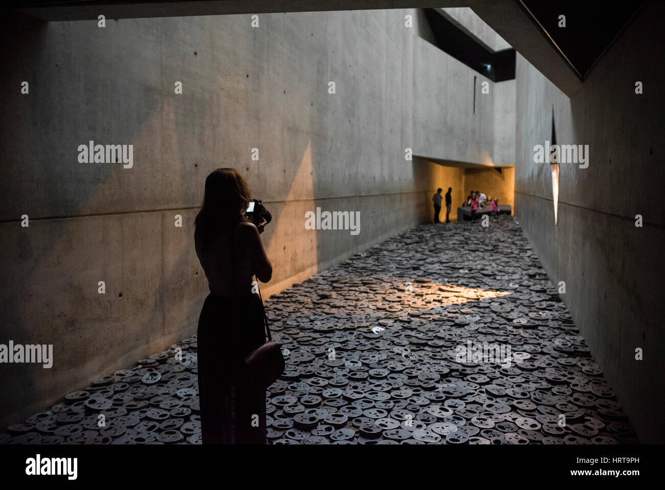 Berlin. Germany. Jewish Museum. Shalekhet (Fallen Leaves) art installation in the Memory Void, by Israeli artist Menashe Kadishman consists of over 10 Stock Photo