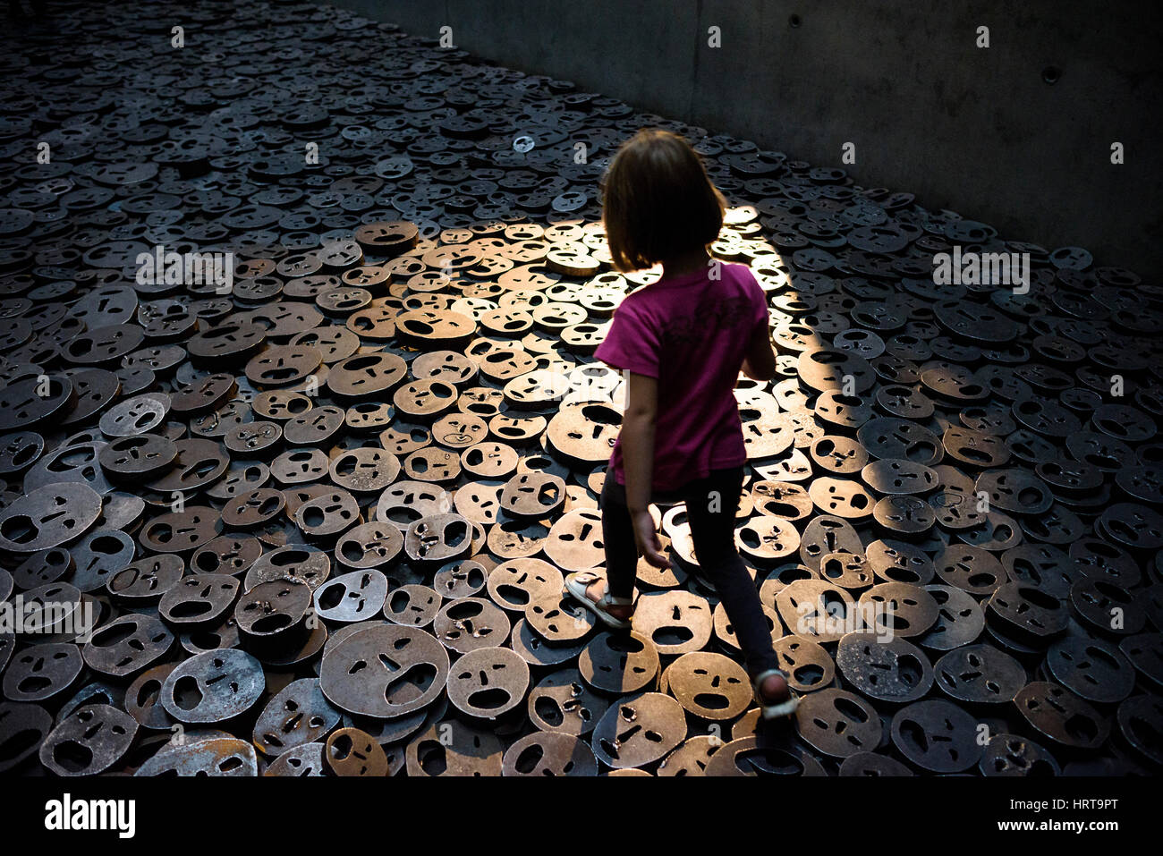 Berlin. Germany. Jewish Museum. Shalekhet (Fallen Leaves) art installation in the Memory Void, by Israeli artist Menashe Kadishman consists of over 10 Stock Photo