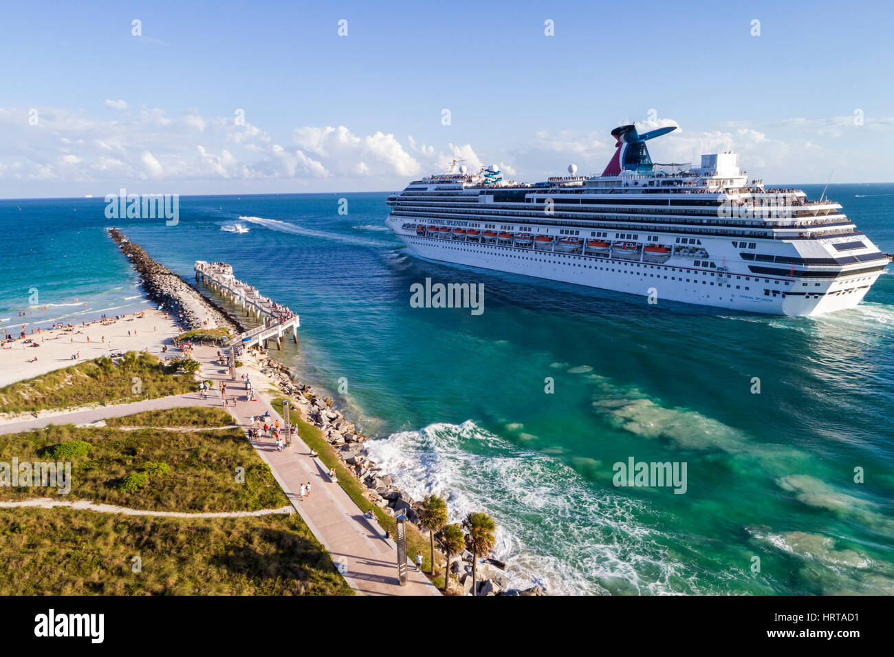 Miami Beach Florida,Atlantic Ocean,Government Cut,South Pointe Park Pier,Carnival Splendor cruise ship,departing Port of Miami,wave wake,aerial overhe Stock Photo