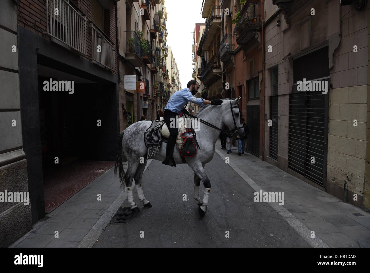 Barcelona, Spain. 03rd Mar, 2017. A man rides a horse during the festival of 'Sant Medir' in