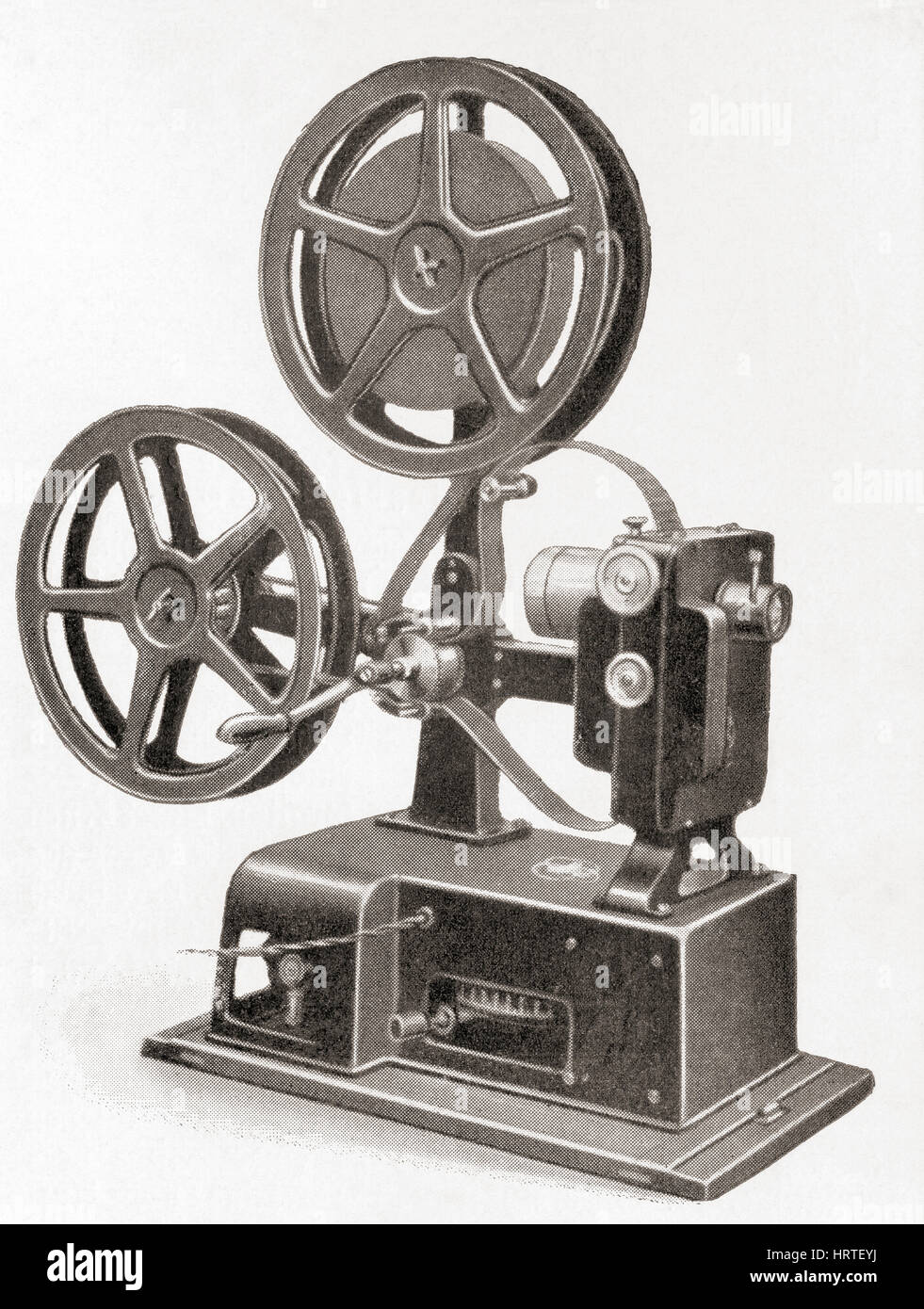 Krupp-Ernemann Kinox II, 35mm Film Projector with hand crank, c.1919.  From Meyers Lexicon, published 1927. Stock Photo