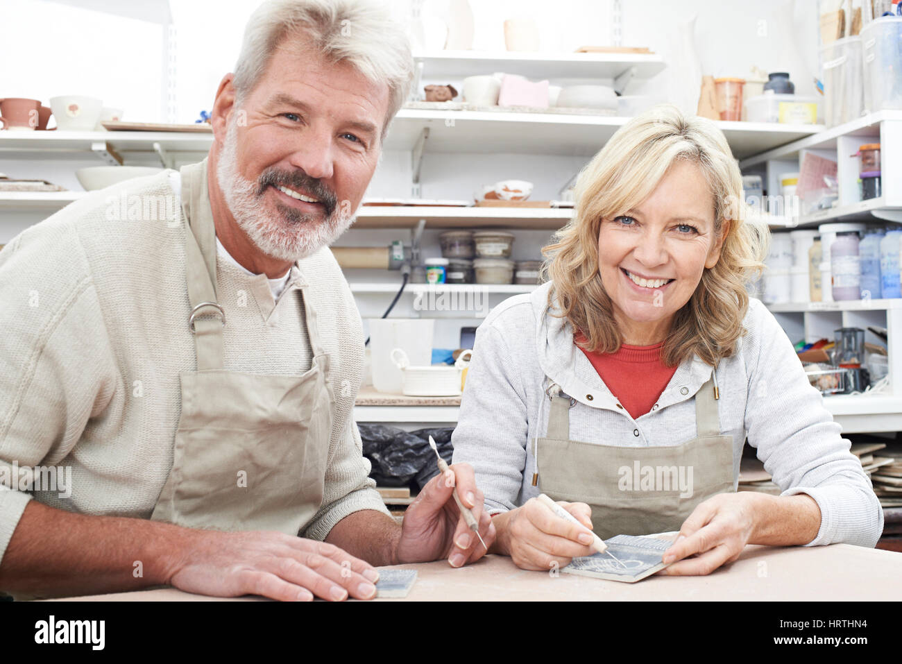 Mature Couple Enjoying Pottery Class Together Stock Photo Alamy