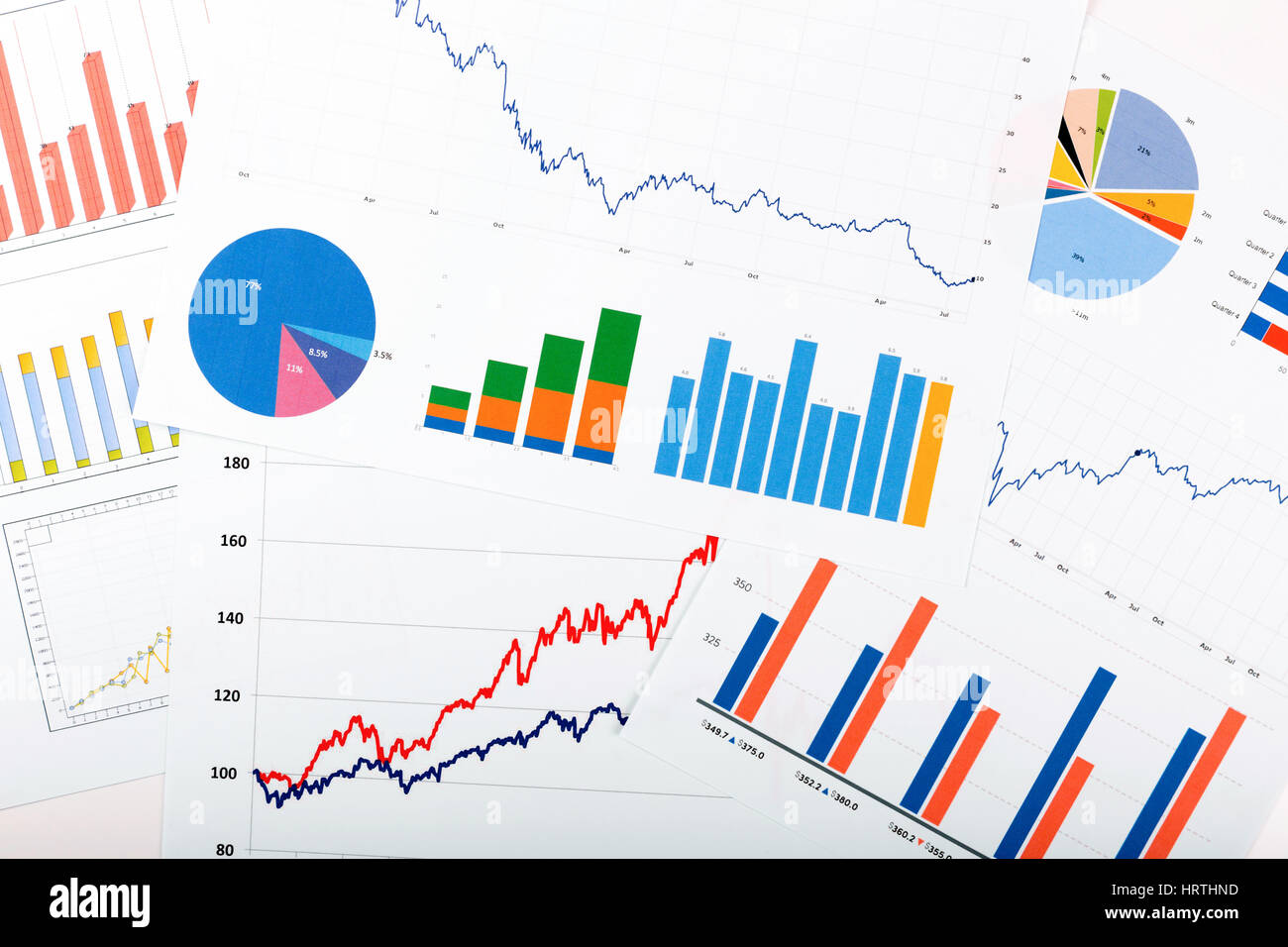 business finance analytics - papers with graphs and charts Stock Photo