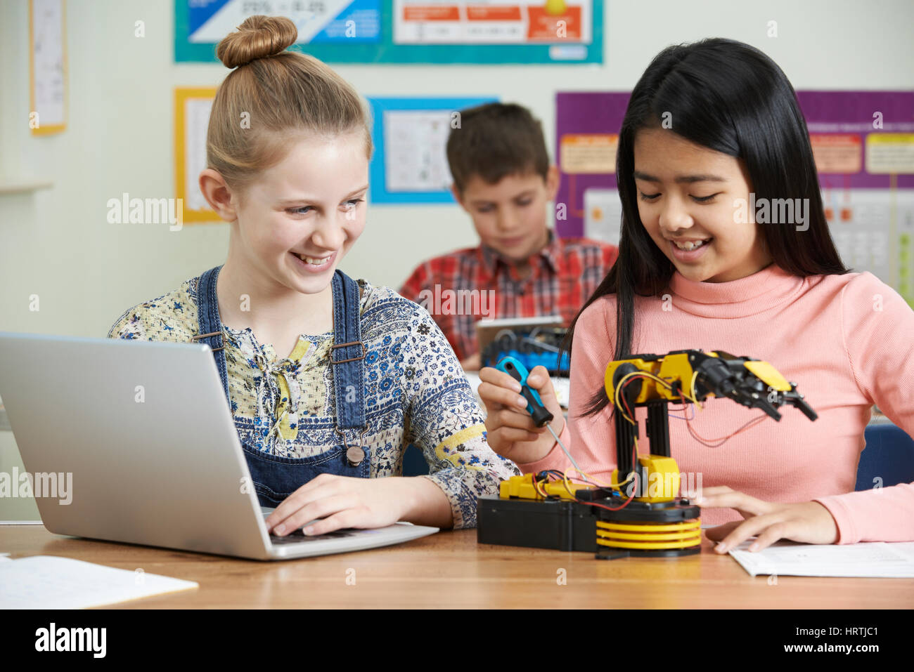 Pupils In Science Lesson Studying Robotics Stock Photo