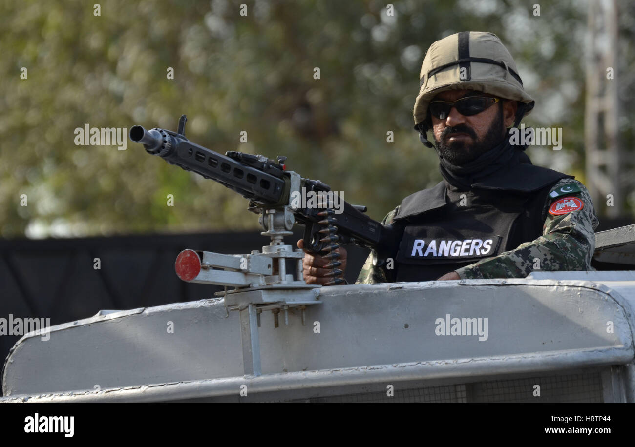 Pakistani paramilitary stand guard in hi-res stock photography and ...