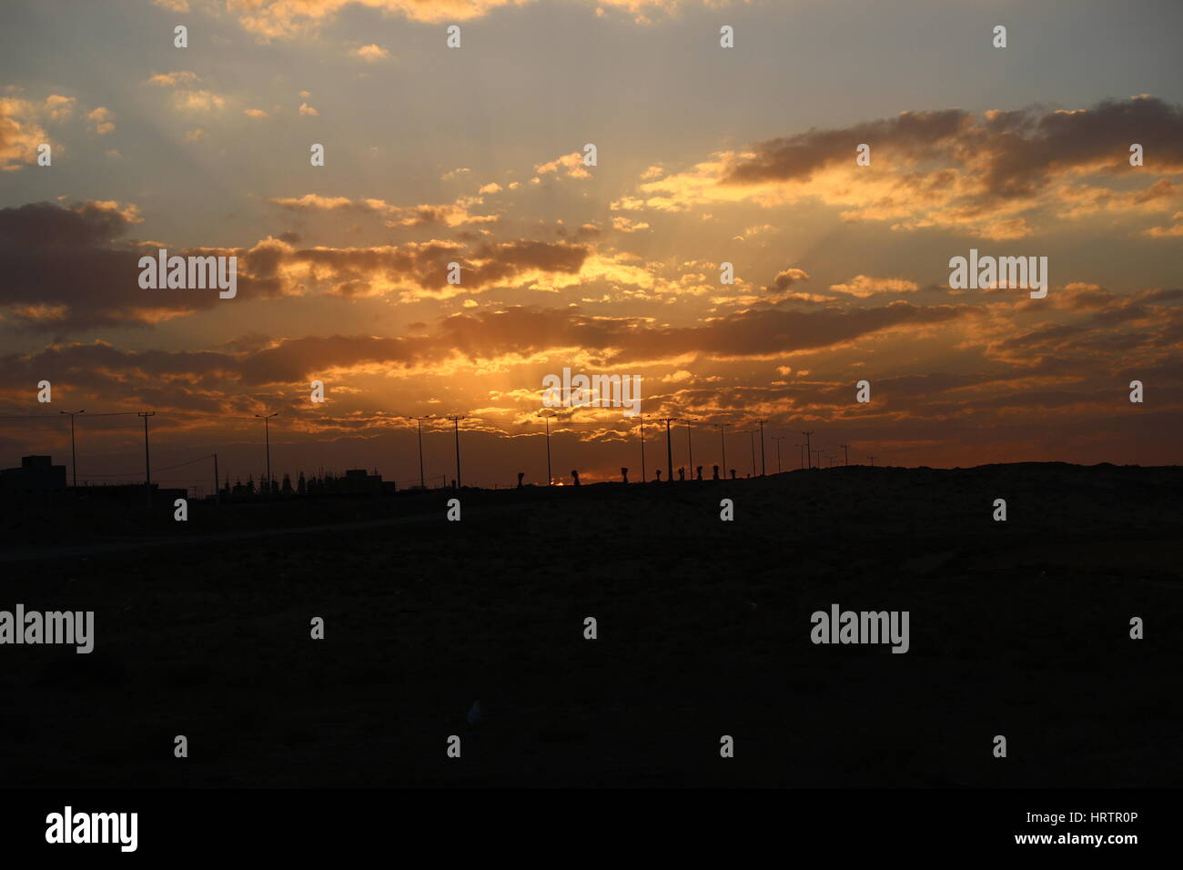 Sunset with clouds Stock Photo - Alamy