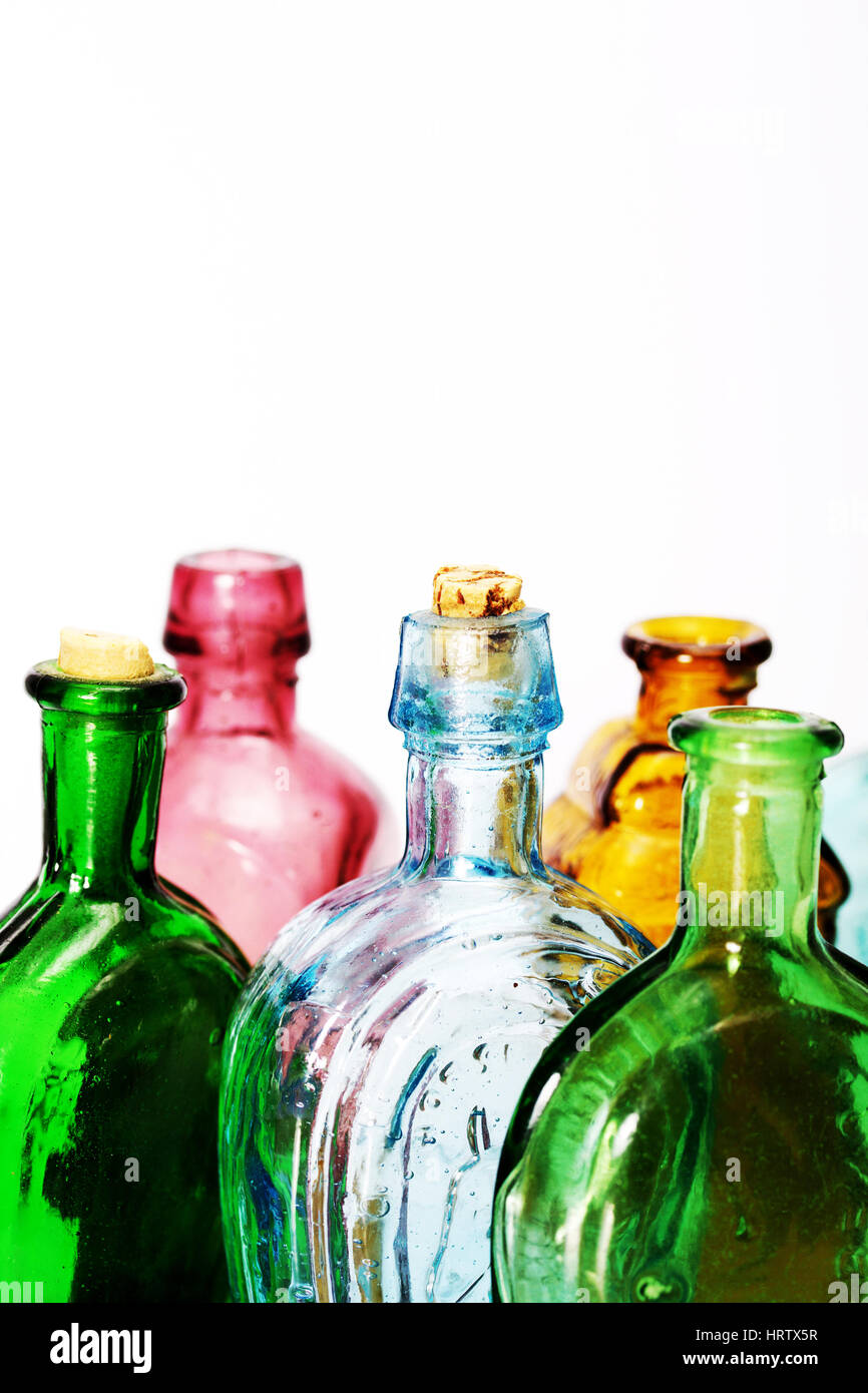 Old colourful vintage bottles against a white background Stock Photo ...