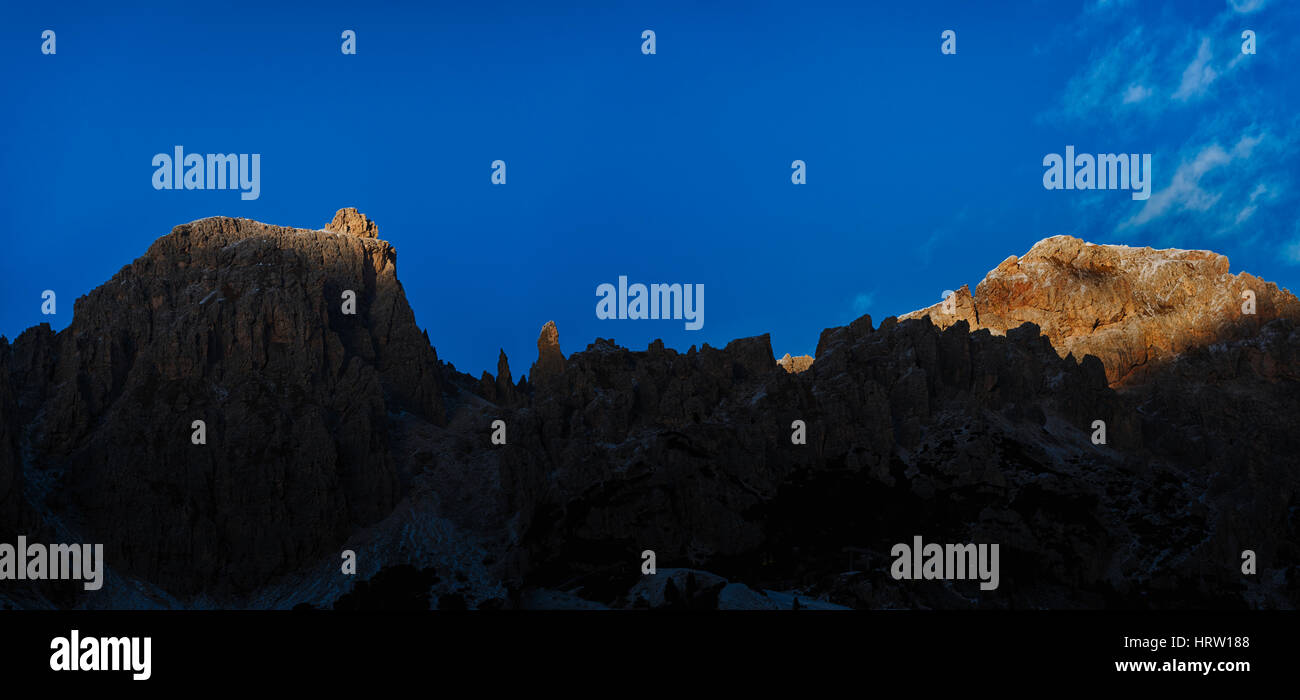 last rays of Sun on the top of Cir Group, Dolomites Stock Photo