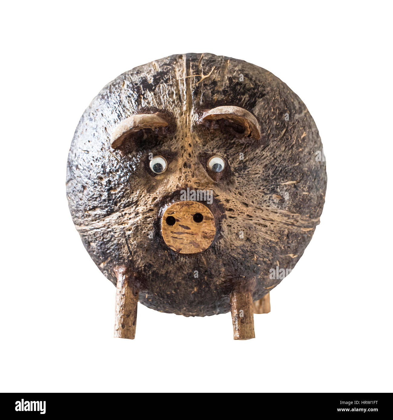 Coconut shell pig is handmade in Thailand on white background Stock