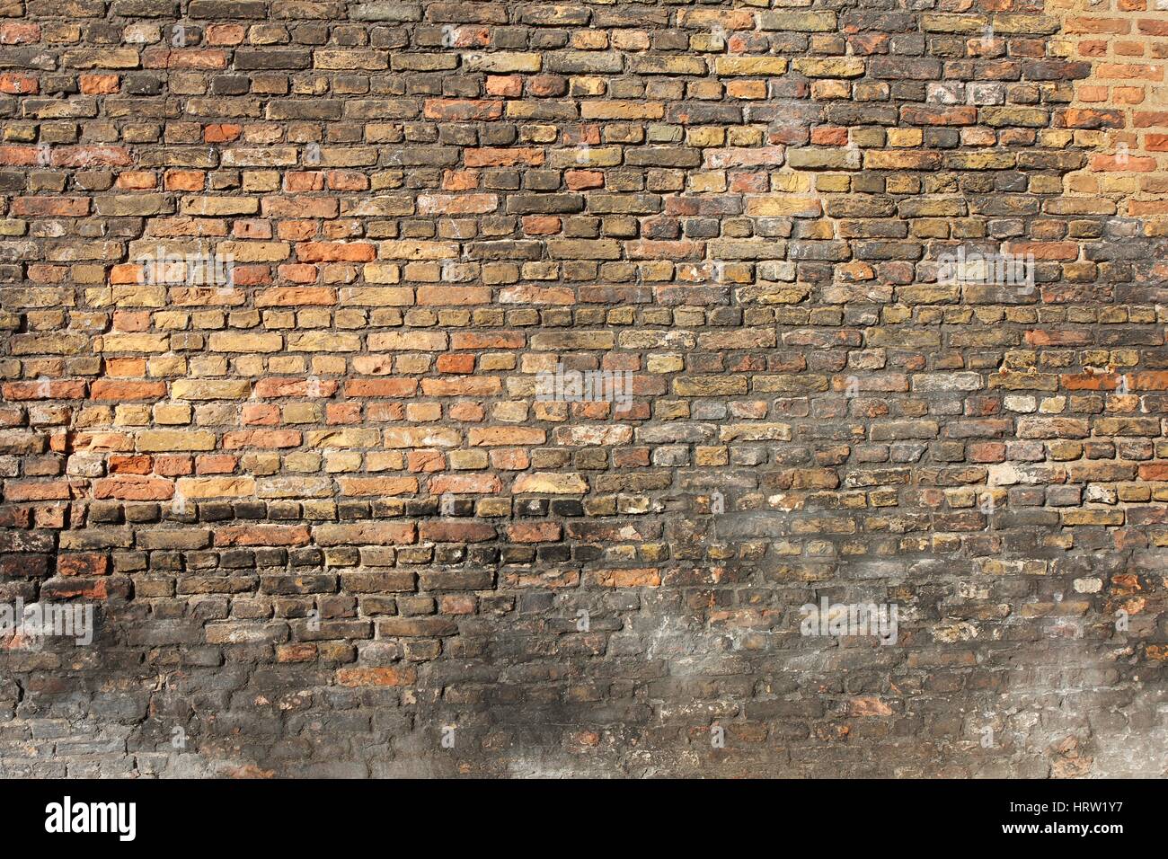 weathered brick wall for background use Stock Photo - Alamy
