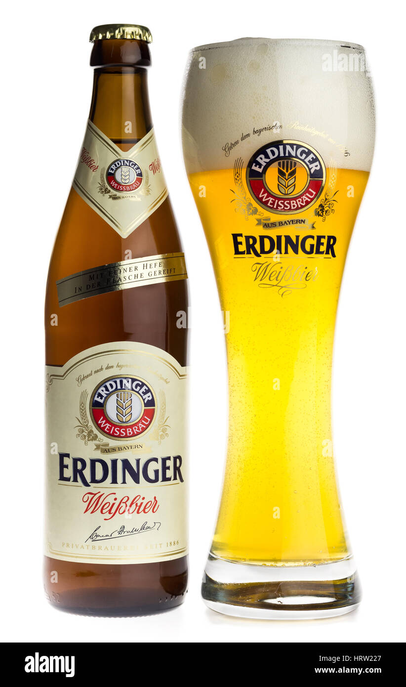 Bottle and glass of German Erdinger light wheat beer isolated on a white background Stock Photo