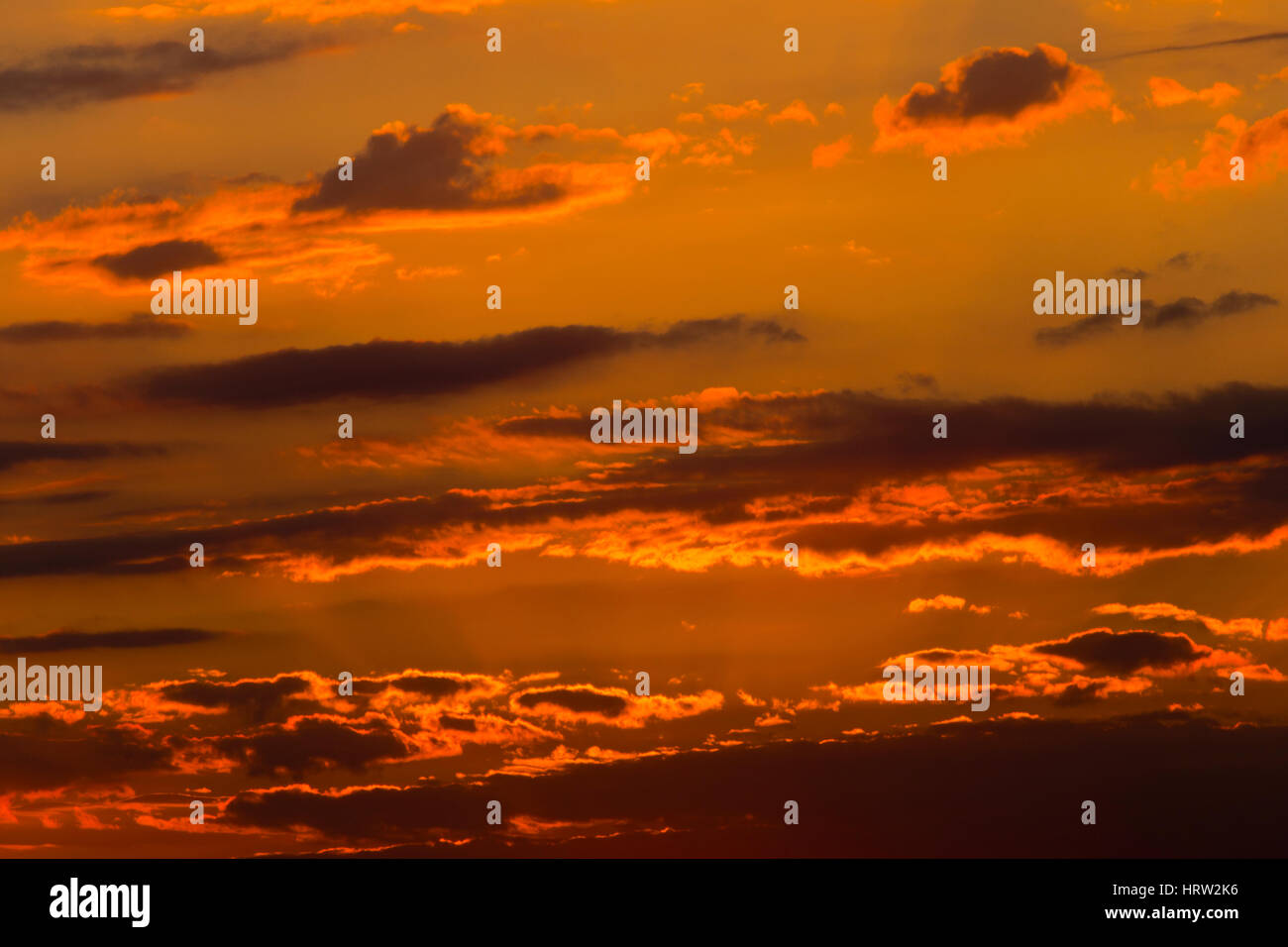 Beautiful sunset with dramatic clouds in the sky Stock Photo - Alamy