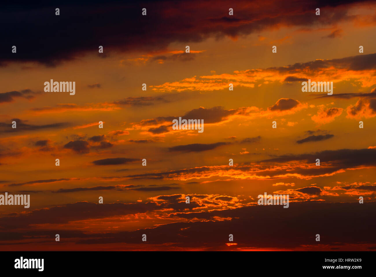 Beautiful sunset with dramatic clouds in the sky Stock Photo - Alamy