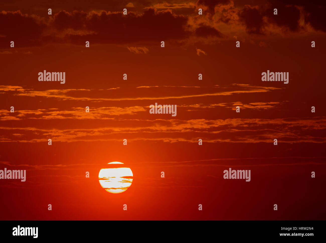 Beautiful sunset with dramatic clouds in the sky Stock Photo - Alamy