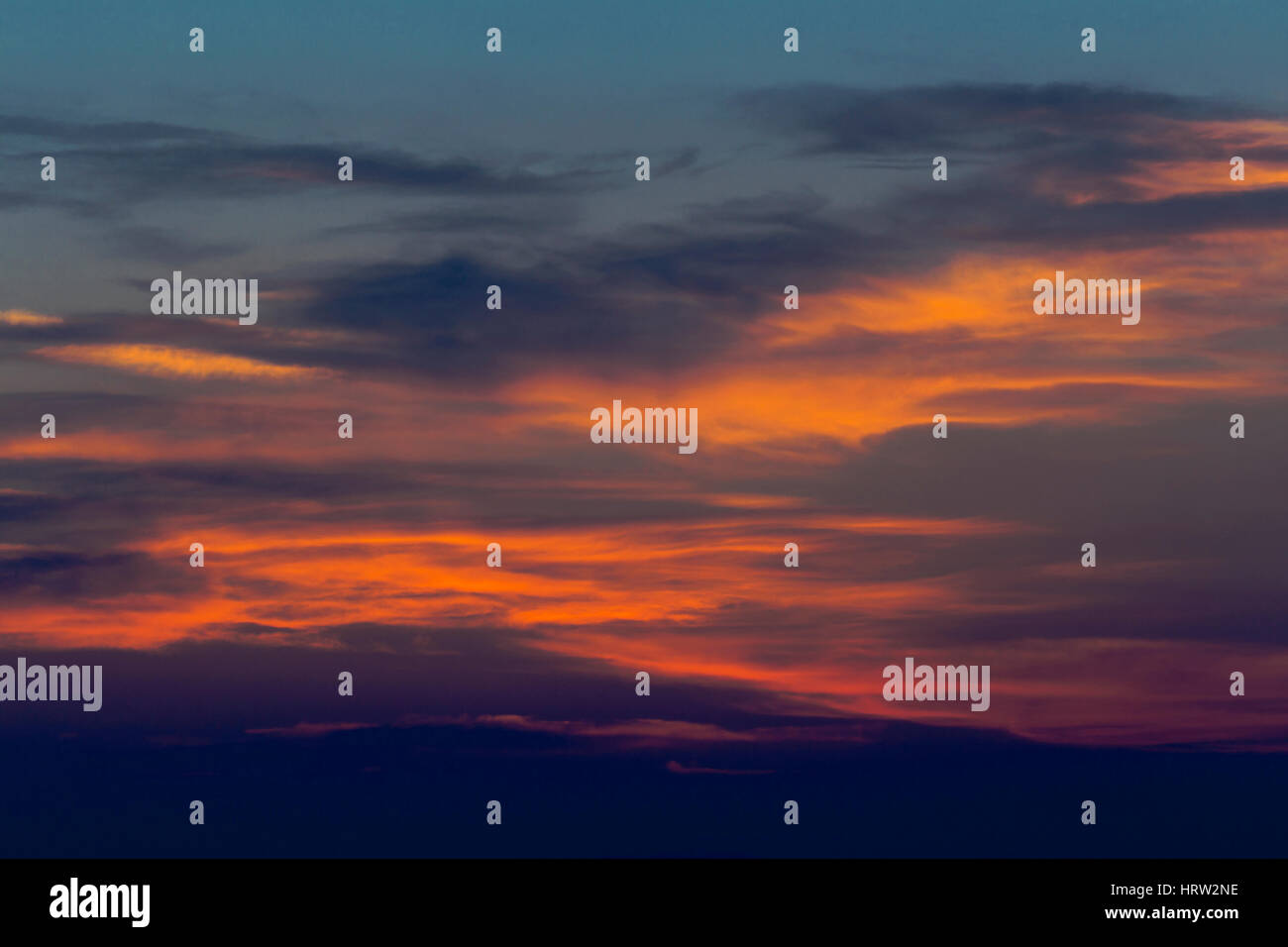 Beautiful sunset with dramatic clouds in the sky Stock Photo - Alamy